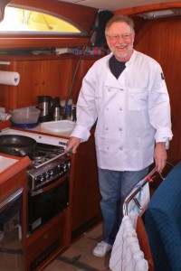 Chef Dennis at work in Sancerre's fully equipped galley. "With a 14.8 foot beam, we could line dance in here."